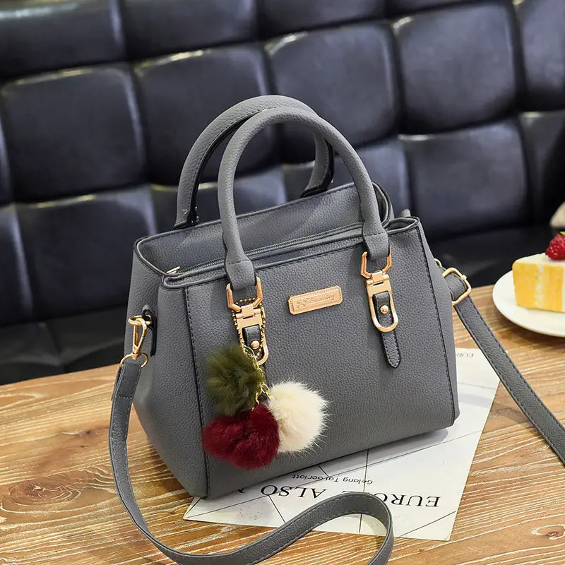 Black Women's Handbag with Pom Pom Charm Shoulder Crossbody